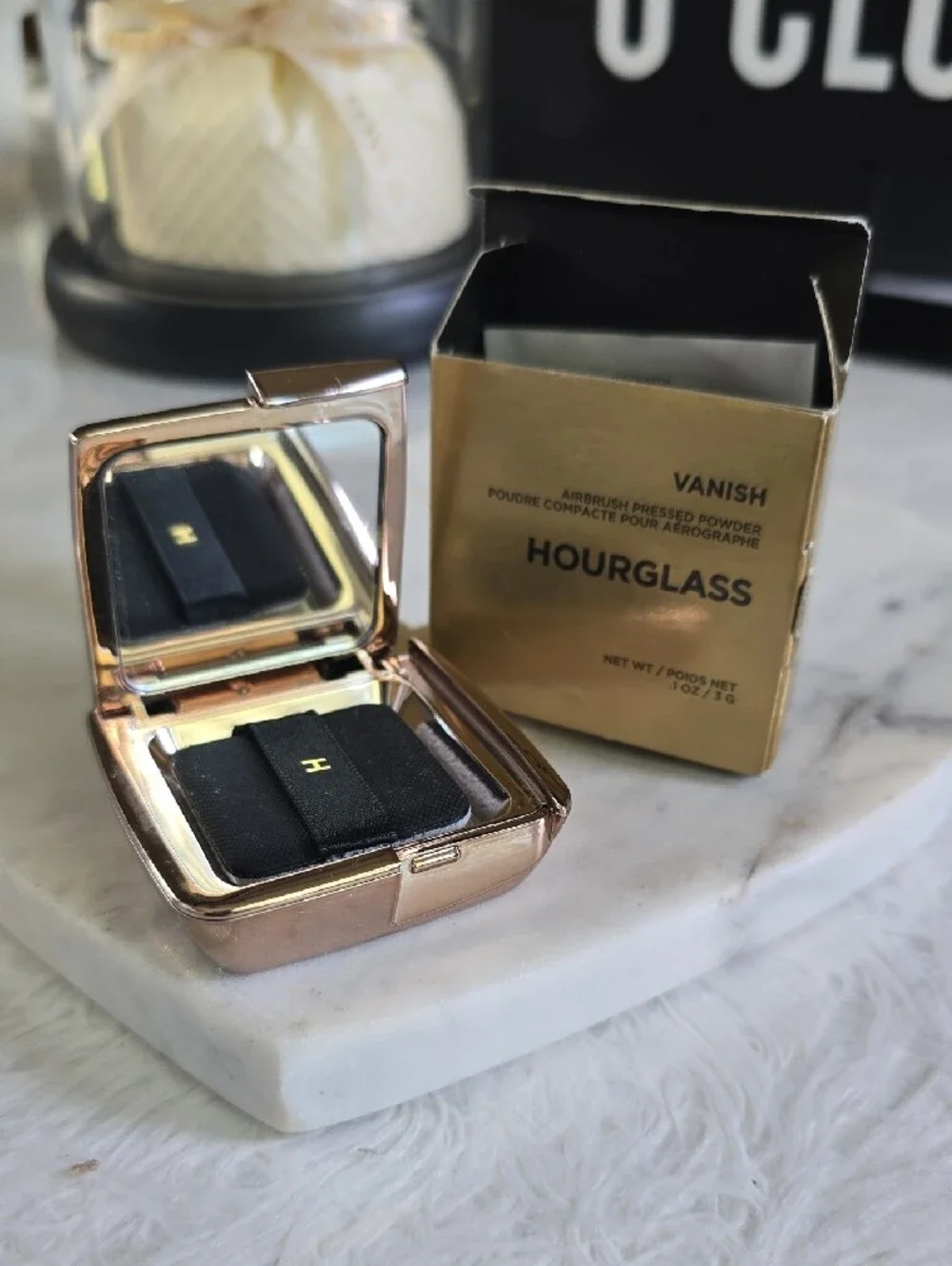 Hourglass compact pressed